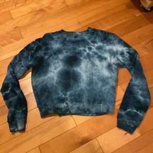 Strut this tie dye sweatshirt crop